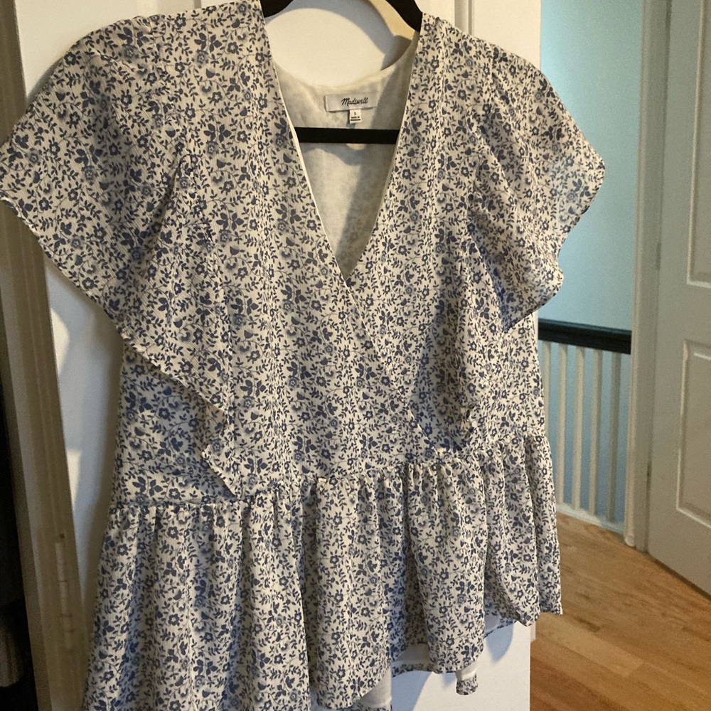 Silk floral peplum v-neck top